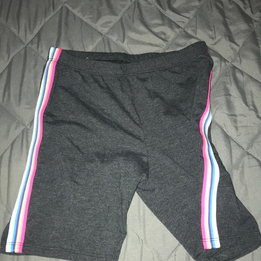 Shorts with rainbow stripes on the side
